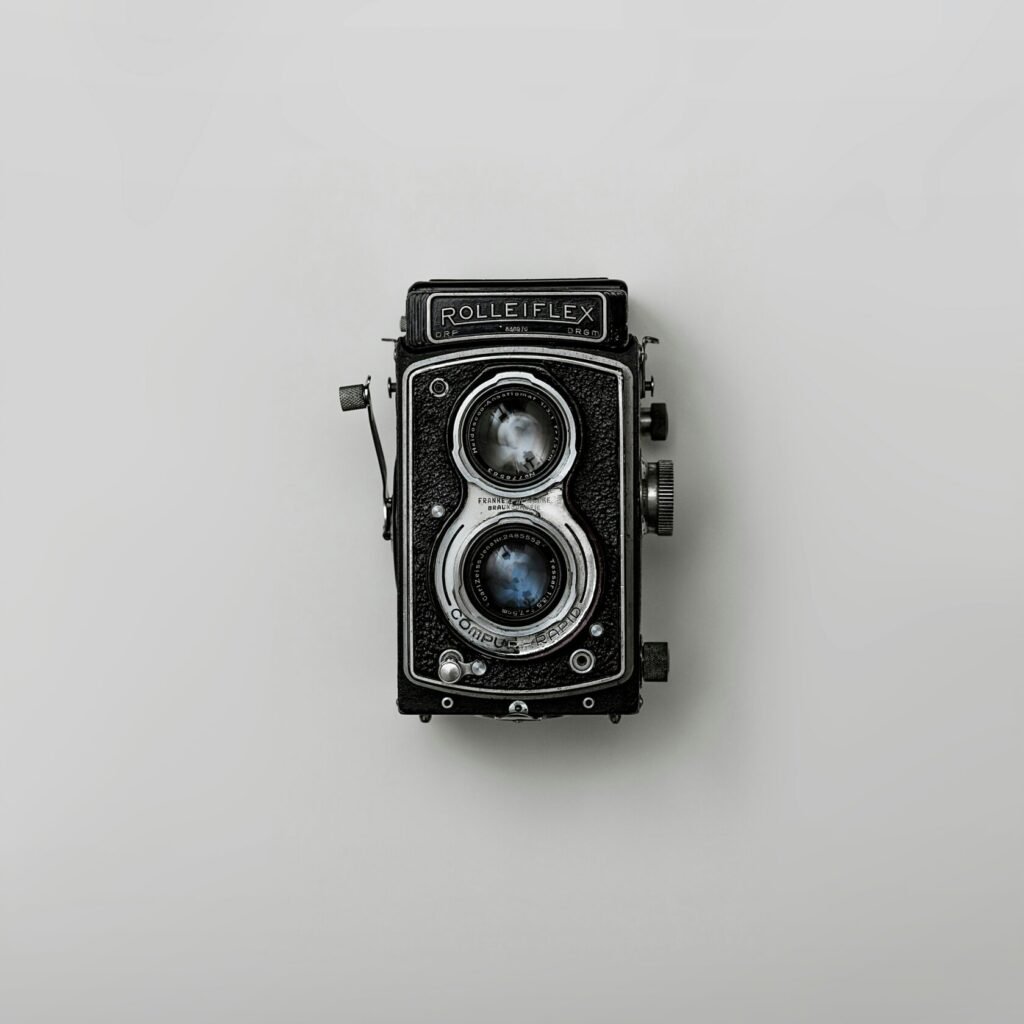 black and silver vintage camera