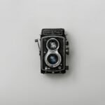 black and silver vintage camera