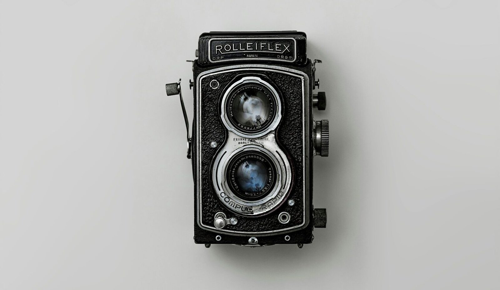 black and silver vintage camera