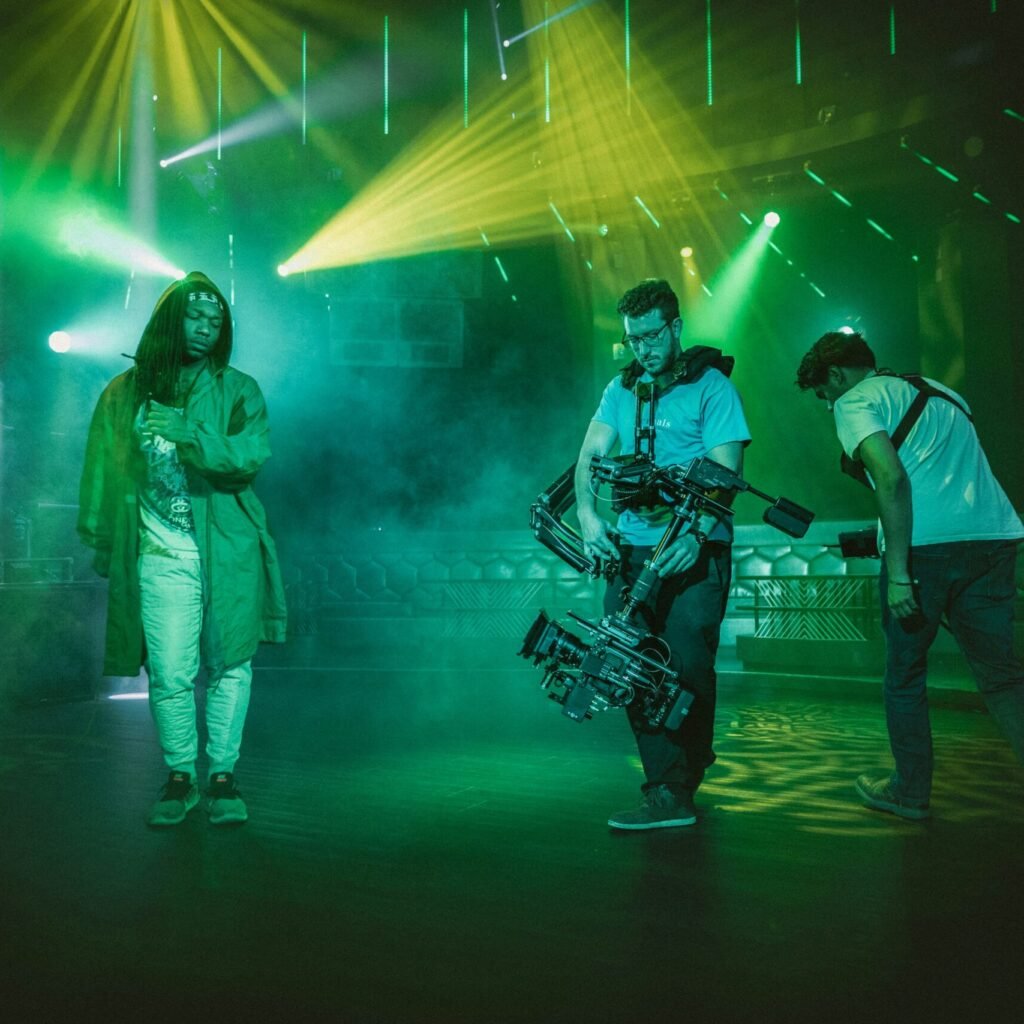 photography of three men playing musical instrument