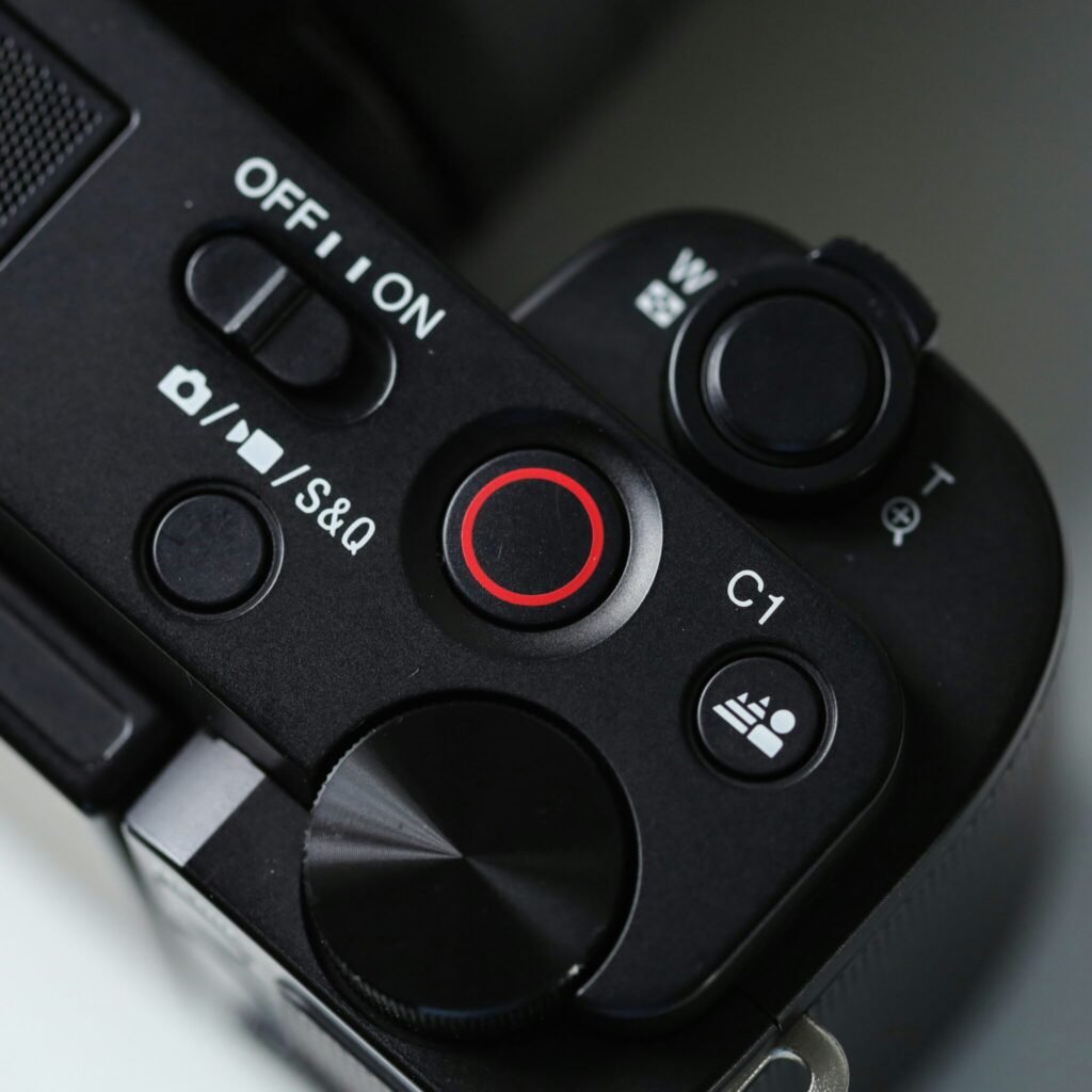 A close up of a camera with buttons on it